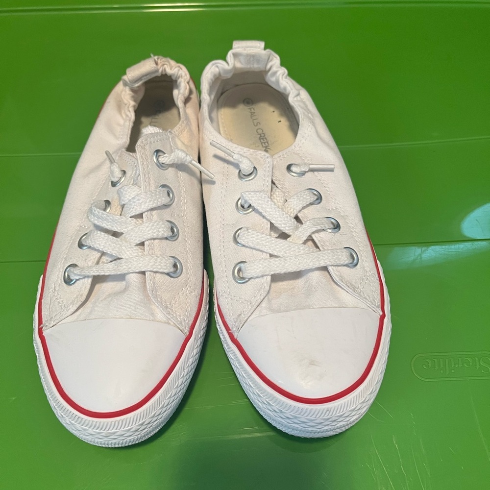 White sneakers with Red Accents
